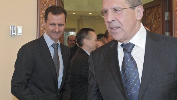 Президент Сирии Башар Асад и глава МИД РФ Сергей Лавров во время встречи в резиденции президента в Дамаске