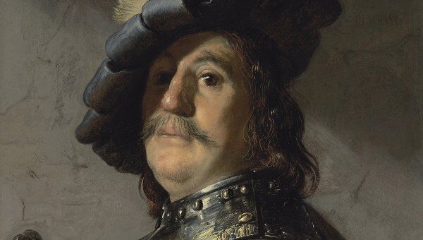Поясной портрет мужчины в нагруднике и шляпе кисти Рембрандта