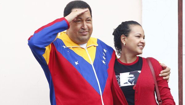Президент Венесуэлы с дочерью Росой на балконе президентского дворца