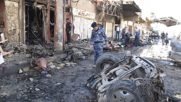 Последствия теракта в иракском городе Хилл