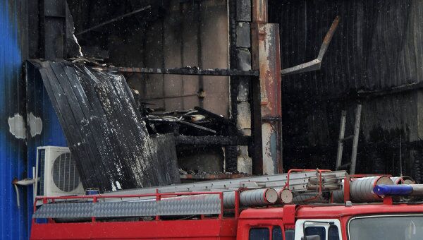 Последствия пожара на Качаловском рынке в Москве