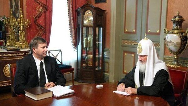 Отредактированная фотография со встречи Патриарха Кирилла с министром юстиции Коноваловым