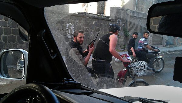 Повстанцы патрулируют улицы района аль Халидия