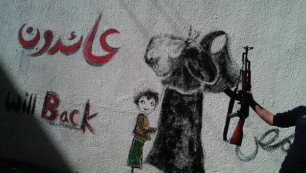 Графити с изображением беженцев и надписью на арабском и английком языках-  вернемся