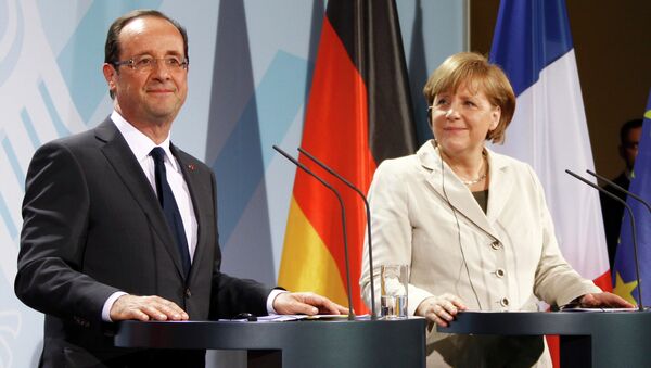 Ангела Меркель и Франсуа Олланд . Архив