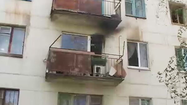 Пожарные спасли мужчину из горящей квартиры в Отрадном