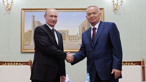 Президент России Владимир Путин и президент Узбекистана Ислам Каримов. Архив