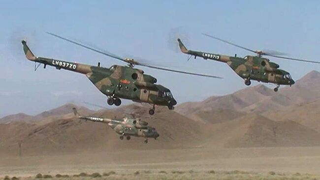 Базу террористов атаковали с вертолетов, окружили танками и взяли штурмом