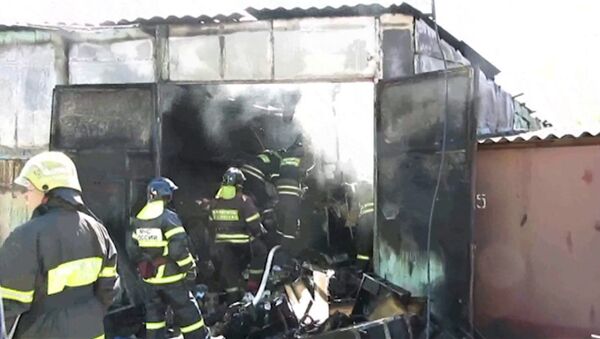 Внедорожник Nissan пострадал в результате пожара в гараже на юге Москвы