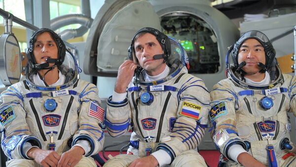 Основной экипаж новой экспедиции - астронавт Сунита Уильямс, космонавт Юрий Маленченко и астронавт Акихомо Хашиде
