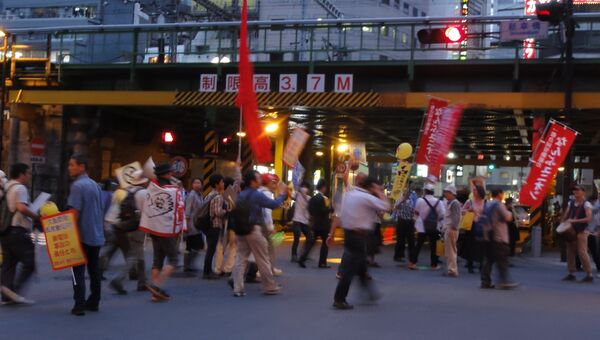 Акция против повторного запуска АЭС прошла в центре Токио