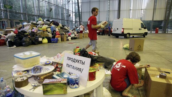 Загрузка и отправка транспорта с гуманитарной помощью пострадавшим в Краснодарском крае