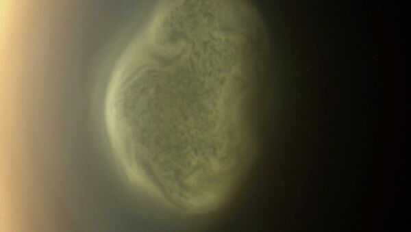 Атмосферный вихрь и одеяло из метанового тумана на южном полюсе Титана говорят о скором наступлении зимы