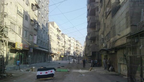Сирийский флаг на одной из улиц Дамаска