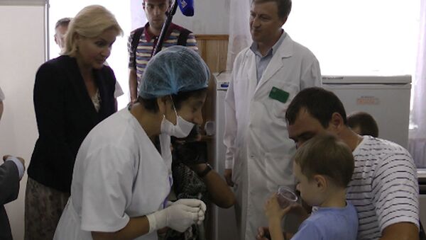 Вице-премьер Голодец уговорила мальчика в Крымске выпить лекарство 