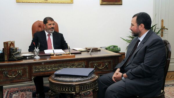 Мохаммед Мурси и Хишам Кандиль