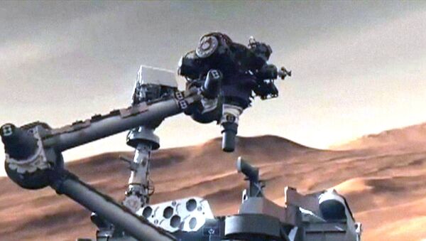 Марсоход Curiosity опустился на Красную планету на небесном кране