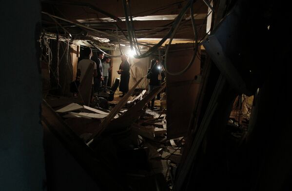 Последствия взрыва в здании телерадиовещательной корпорации в Дамаске