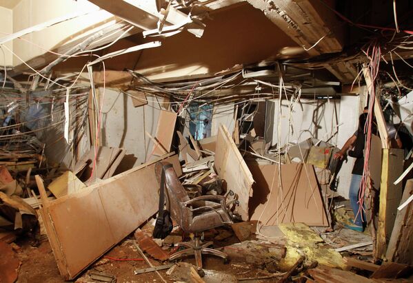 Последствия взрыва в здании телерадиовещательной корпорации в Дамаске