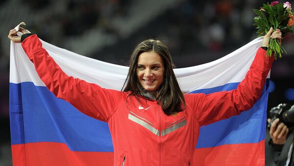 Российская спортсменка Елена Исинбаева, завоевавшая бронзовую медаль в соревнованиях по прыжкам с шестом