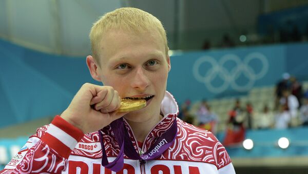 Россиянин Илья Захаров, занявший первое место в прыжках в воду с 3-метрового трамплина