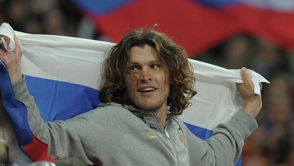 Россиянин Иван Ухов, завоевавший золотую медаль в финальных соревнованиях по прыжкам в высоту 
