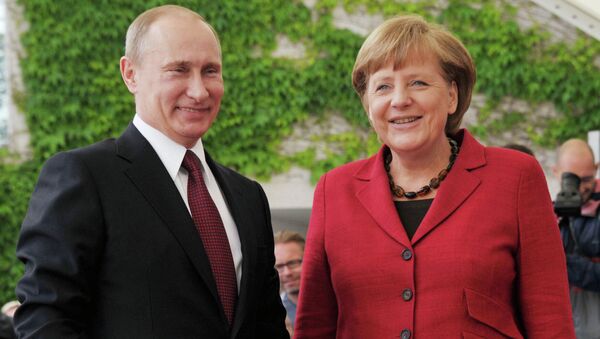 Владимир Путина  и Ангела Меркель. Архивное фото
