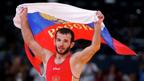 Российский борец вольного стиля Джамал Отарсултанов выиграл золото Олимпиады