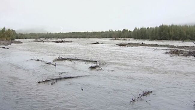 Затопленная в результате проливных дождей дорога. Архивное фото