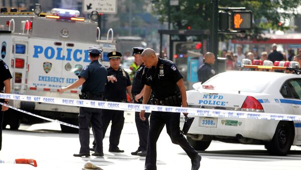 Полиция работает на месте перестрелки возле Empire State Building в Нью-Йорке