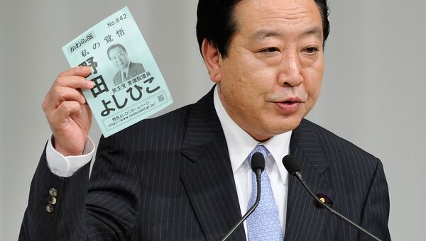Премьер Японии не уйдет в отставку, несмотря на резолюцию парламента
