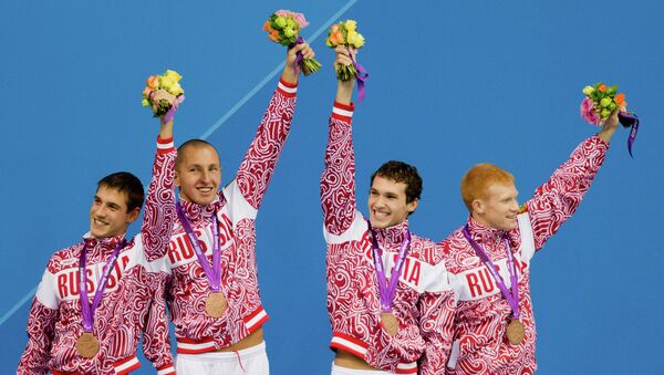 Российские пловцы Константин Лисенков, Евгений Зимин, Денис Тарасов и Дмитрий Григорьев на Паралимпийских играх 2012 в Лондоне.