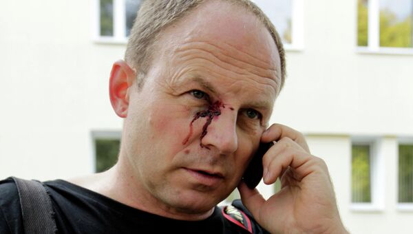 Во время задержания журналистов пострадал фотокорреспондент Ассошиэйтед Пресс Сергей Гриц