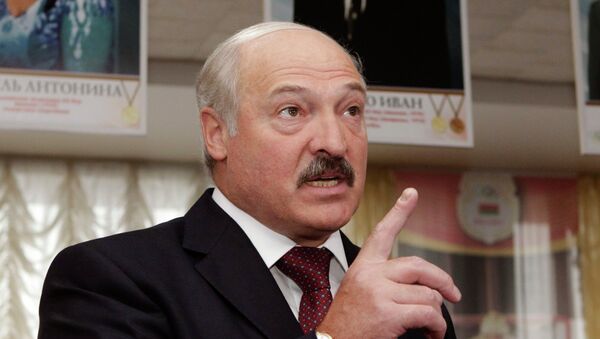 Президент Белоруссии Александр Лукашенко на избирательном участке