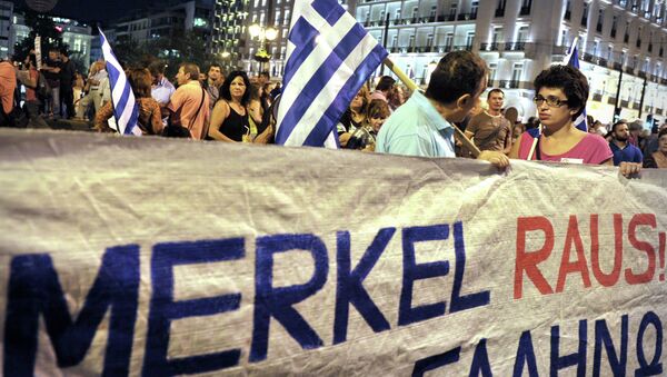 Забастовки в Афинах в день визита канцлера Германии Ангелы Меркель