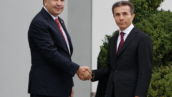 Президент Грузии Михаил Саакашвили и кандидат в премьер-министры Бидзина Иванишвили