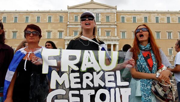 Забастовки в Афинах в день визита канцлера Германии Ангелы Меркель