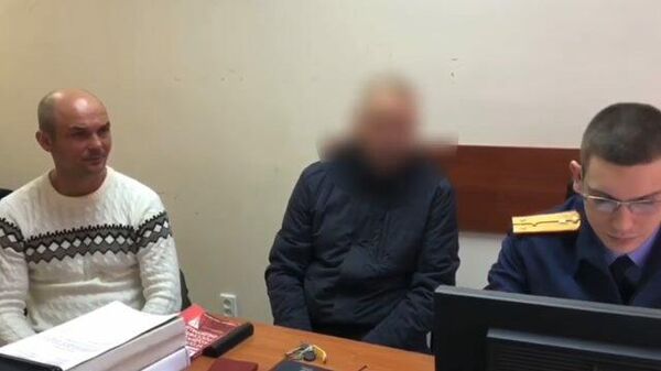 Кадры допроса отца детей, оставленных в аэропорту Шереметьево