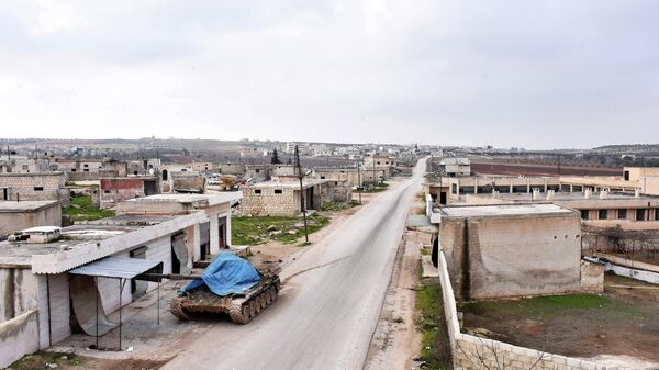 Танк на улице в сирийской провинции Идлиб
