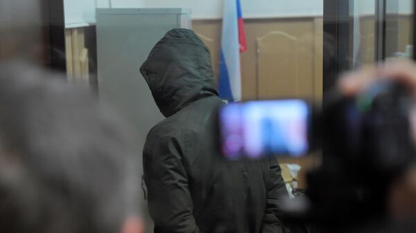 Бывший сотрудник полиции Роман Феофанов перед началом заседания Басманного суда города Москвы
