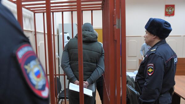 Бывший сотрудник полиции Максим Уметбаев на заседании Басманного суда города Москвы