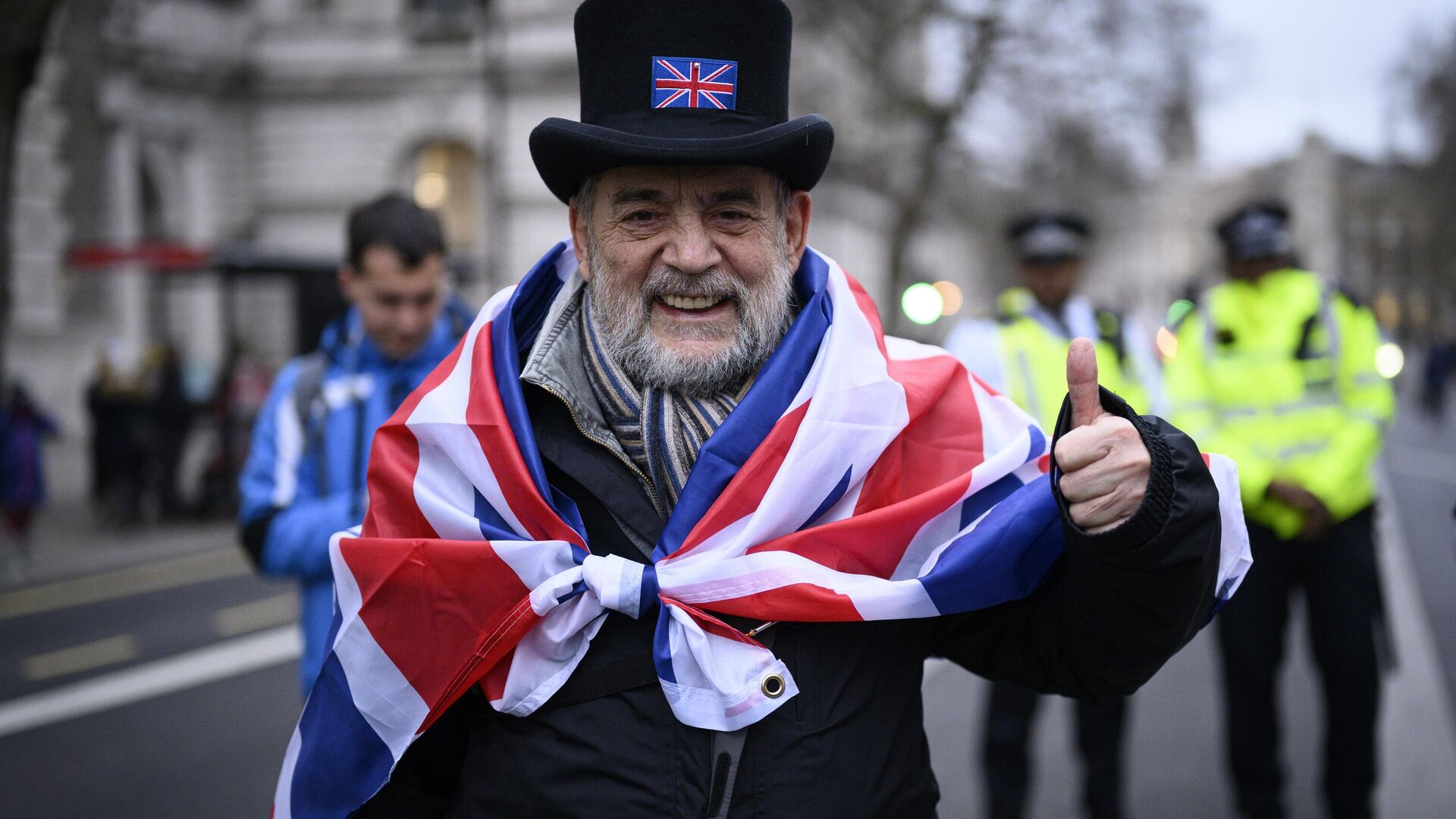 Сторонник Brexit на торжественных мероприятиях, посвященных выходу Великобритании из ЕС (Brexit Party) на площади Парламента в Лондоне - РИА Новости, 1920, 07.02.2023