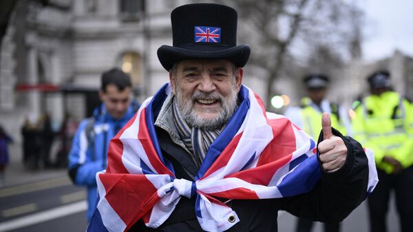 Сторонник Brexit на торжественных мероприятиях, посвященных выходу Великобритании из ЕС (Brexit Party) на площади Парламента в Лондоне