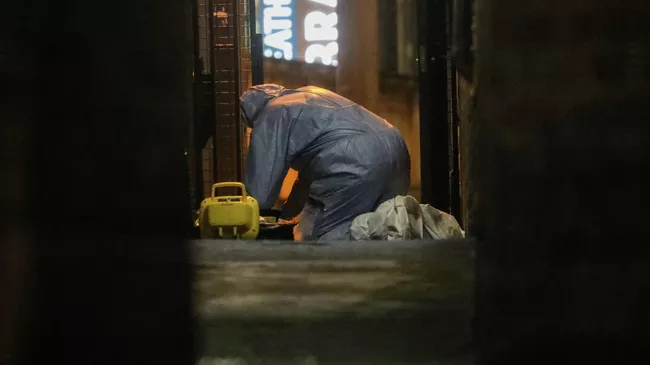Судмедэксперт  на месте происшествия в районе Стретэм, Лондон. 2 февраля 2020