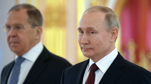 Президент РФ Владимир Путин и министр иностранных дел РФ Сергей Лавров