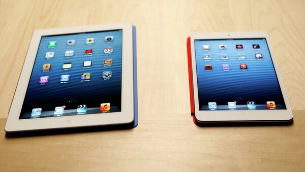 Планшет iPad mini и полноразмерный iPad