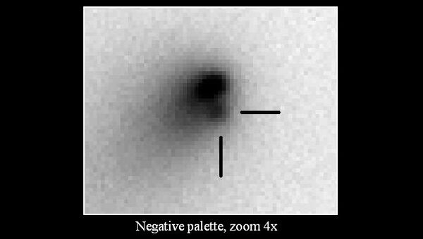 Комета Хергенротера до того, как от ее ядра откололся фрагмент. Негатив