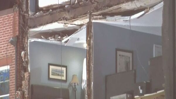 Ураган Сэнди сломал подъемный кран и оставил без стен квартиры в США