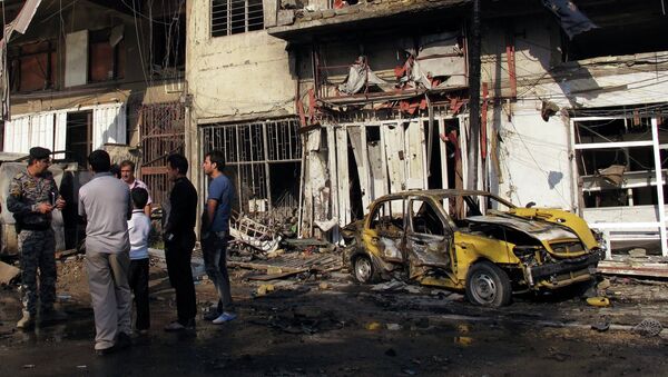 Один из взорвавшихся автомобилей в Багдаде, Ирак. 