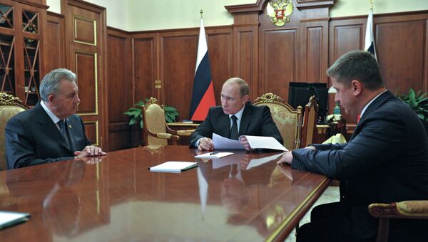 В.Путин встретился с В.Ишаевым и Е.Додом